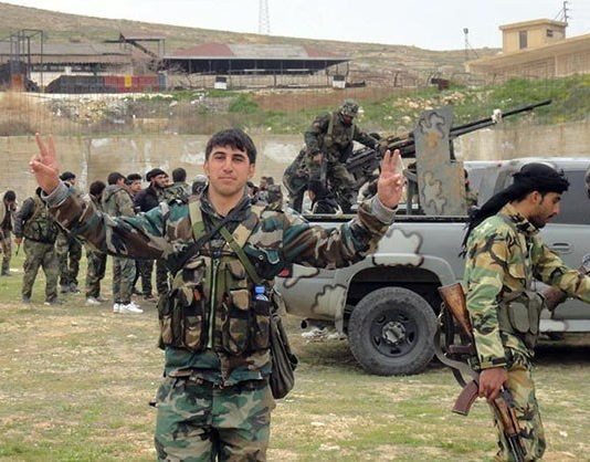 Syrian troops celebrate victory over terrorists in the Hama district