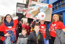 Children whose lives have been saved by the Royal Brompton Hospital marching against the closure of its heart unit