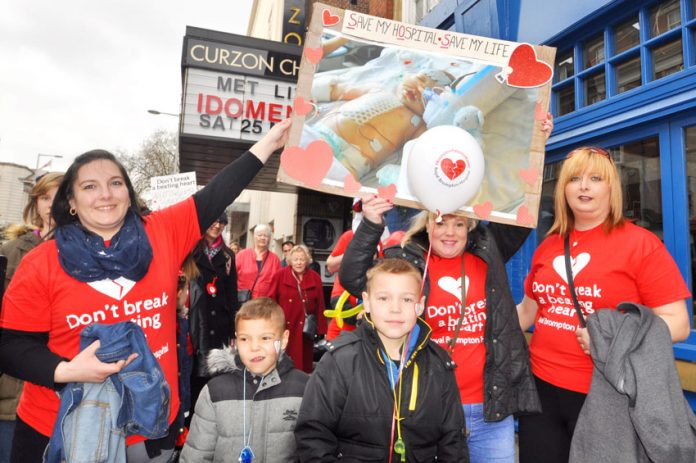 Children whose lives have been saved by the Royal Brompton Hospital marching against the closure of its heart unit