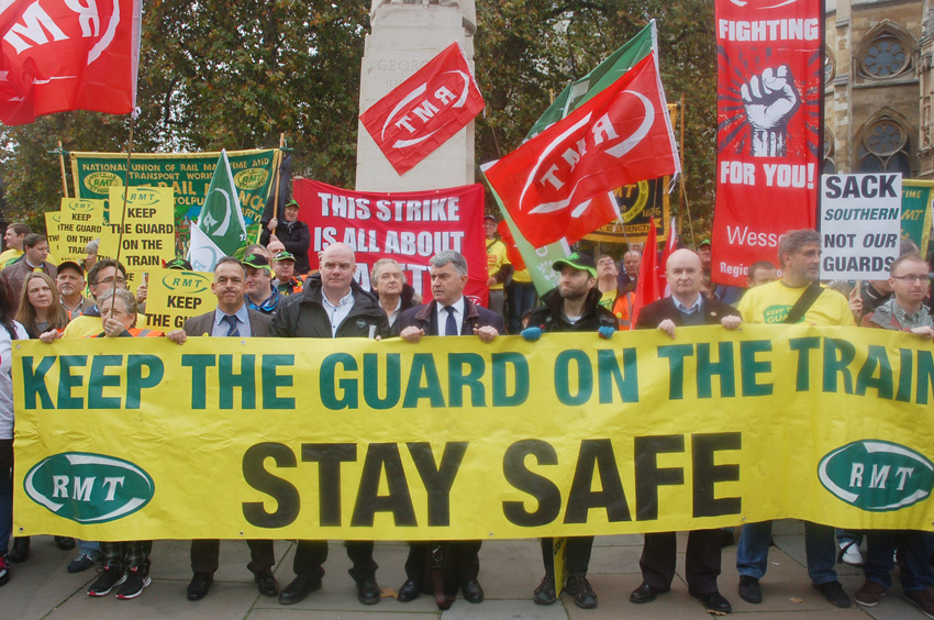 RMT and supporters demonstrate outside the House of Commons for passenger safety, insisting guards must be kept on the trains