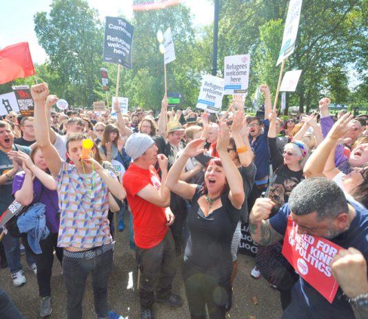 Crowds of supporters celebrate the election of Jeremy Corbyn as Labour Party leader at the Refugees Welcome march in September 2015