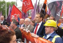 Labour leader CORBYN marching with steel workers in defence of jobs