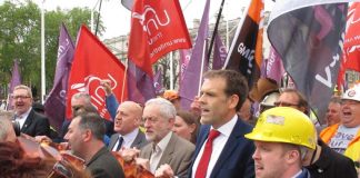 Labour leader CORBYN marching with steel workers in defence of jobs