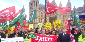 Over 150 RMT members demonstrated for train safety and the ending of Driver Only Operation outside Parliament yesterday