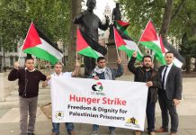 AYSAR SHAMALLAKH (left) launching his hunger strike at 6.00pm on Tuesday 2nd May in Parliament Square under the statue of Nelson Mandela in solidarity with 1,600 Palestinian prisoners of Israel
