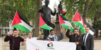 AYSAR SHAMALLAKH (left) launching his hunger strike at 6.00pm on Tuesday 2nd May in Parliament Square under the statue of Nelson Mandela in solidarity with 1,600 Palestinian prisoners of Israel