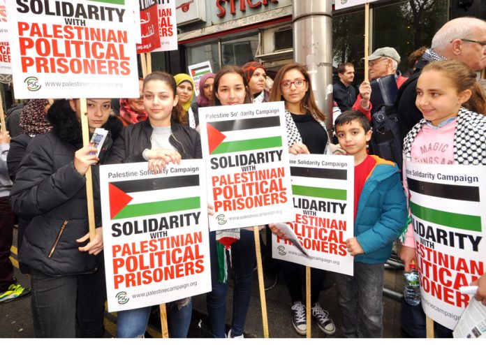 Youth at the picket in support of Palestinian hunger strikers outside the Israeli embassy in London last Saturday