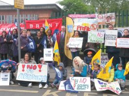 Parents pupils and teachers demonstrate against academies – Academies Enterprise Trust (AET) plan to sack caretakers and others to save £1.4m