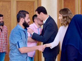 Syrian President BASHAR AL-ASSAD and his wife ASMA received thirty-four residents of Barzeh who were detained by the armed terrorist groups  before they were lately released