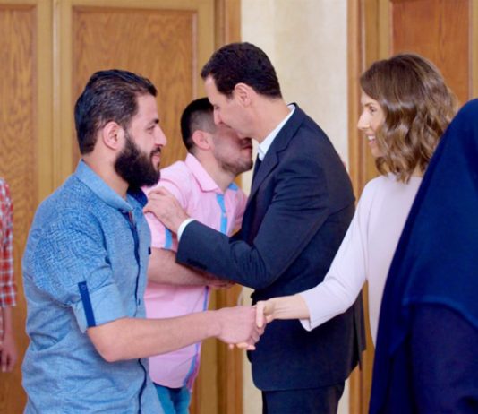 Syrian President BASHAR AL-ASSAD and his wife ASMA received thirty-four residents of Barzeh who were detained by the armed terrorist groups  before they were lately released