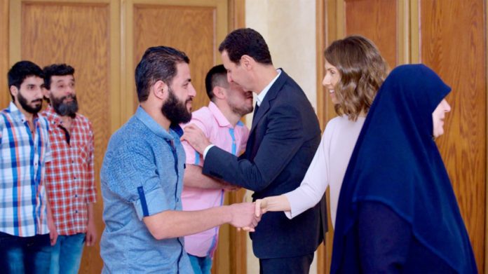 Syrian President BASHAR AL-ASSAD and his wife ASMA received thirty-four residents of Barzeh who were detained by the armed terrorist groups  before they were lately released
