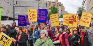 Workers from the Ritzy cinema in Brixton marching to demand the London Living wage. Three union reps there have been sacked