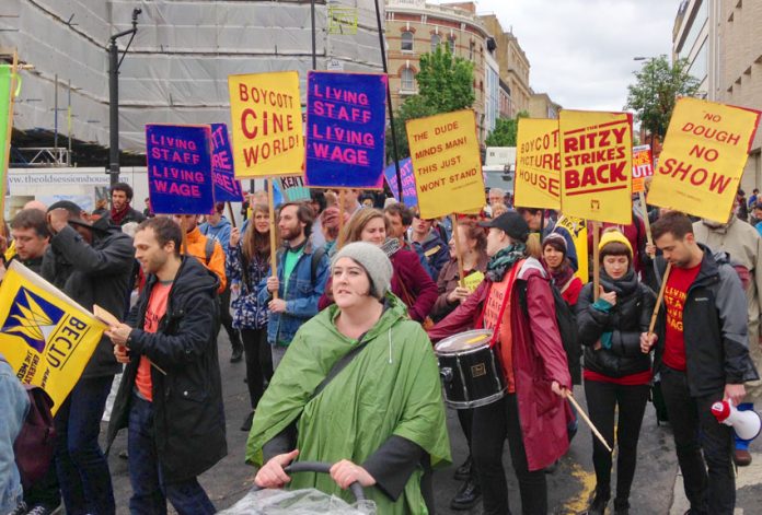 Workers from the Ritzy cinema in Brixton marching to demand the London Living wage. Three union reps there have been sacked