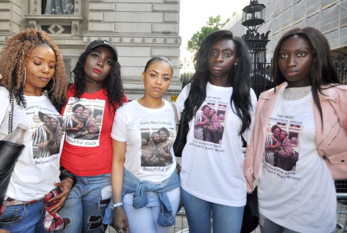 At Friday night’s demonstration outside Downing Street were KIARA, MARY, SISSY, and Adelaide and Linguere MENDY, all nieces of Mary Mendy and cousins to her daughter Khadija who are both missing following the blaze at Grenfell Tower