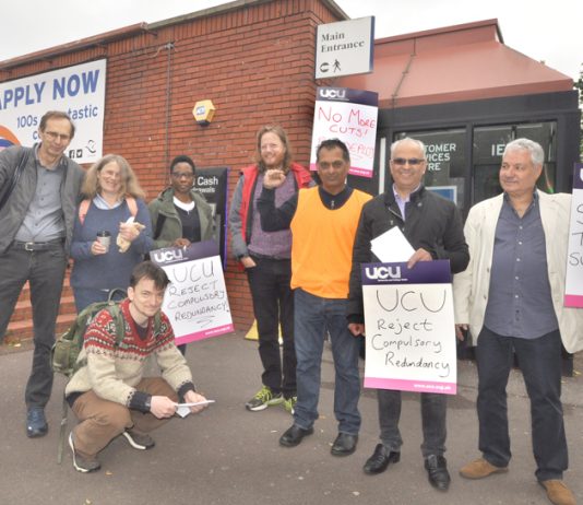 Lecturers on the picket line  at West London College in Hammersmith yesterday morning – fighting job cuts