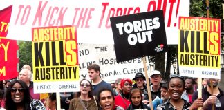 Protesters on Saturday’s “Tories Out’ march demand ‘Justice for Grenfell’