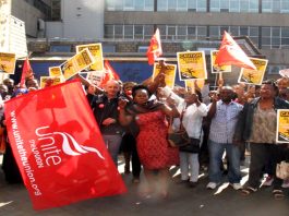 Royal London Workers Battle Serco Low Pay! Striking Serco workers at the Bart’s NHS Trust at Tuesday’s rally outside the Royal London Hospital in Whitechapel in East London