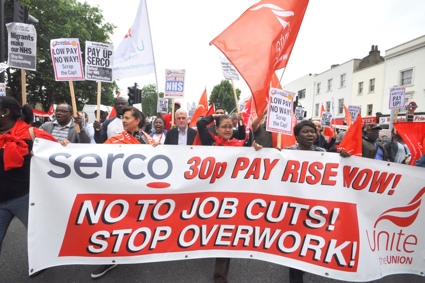 Labour’s JOHN McDONNELL behind the banner of the Serco strikers marching through east London on Saturday