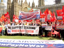 Pilots criticise BA’s strikebreaking scheme MPs stood behind the banner of the striking BA mixed fleet cabin crew outside Parliament last Wednesday