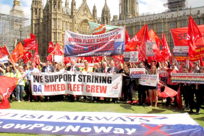 MPs stood behind the banner of the striking BA mixed fleet cabin crew outside Parliament last Wednesday