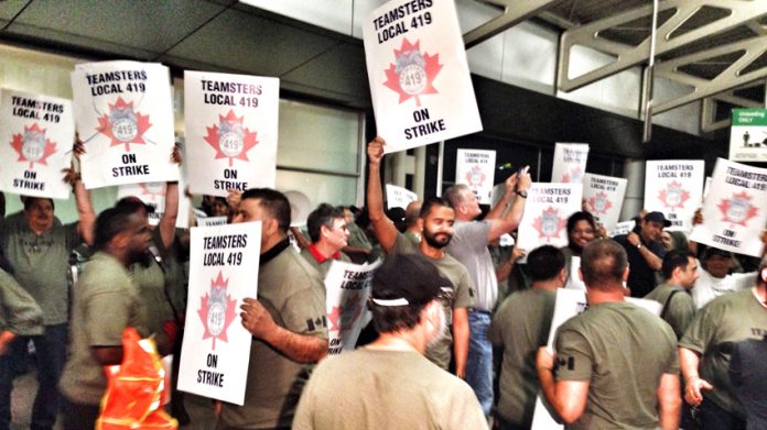 Ground crew workers starting their strike at Toronto’s Pearson International Airport at 9.30pm last Thursday