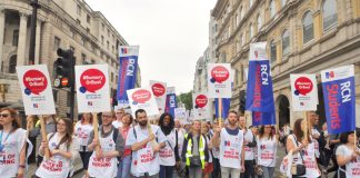 Nurses marching in defence of the NHS demanding the restoration of bursaries