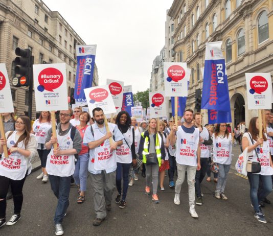 Nurses marching in defence of the NHS demanding the restoration of bursaries