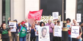 Picket yesterday led by officers of the South African community organisation Sikhala Sonkae condemned Lonmin as having the blood of murdered miners on its hands