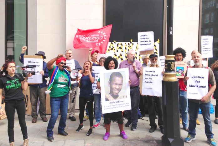 Picket yesterday led by officers of the South African community organisation Sikhala Sonkae condemned Lonmin as having the blood of murdered miners on its hands