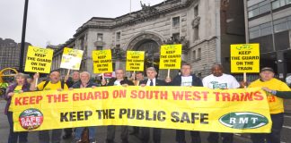 RMT demonstration yesterday morning at Waterloo Station demanding South West Trains keeps their guards on trains in the interest of passenger safety