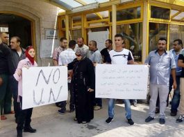 Palestinians demonstrate against the closure on August 11th of the UNRWA hospital in Qalqiliya