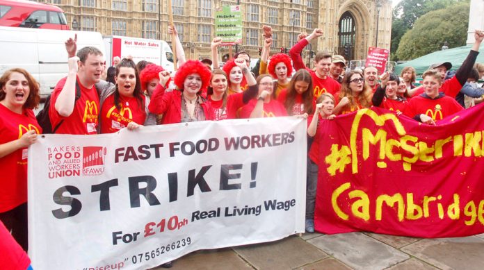 McDonald’s restaurant strikers from Cambridge and Crayford take their demand for £10 an hour to Parliament yesterday