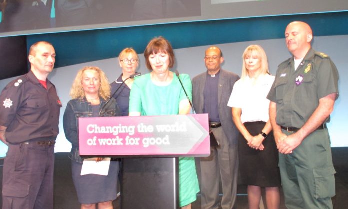 British TUC General Secretary FRANCES O’GRADY (centre) yesterday welcoming six emergency workers to Congress who had been involved in the Manchester, Westminster and Finsbury Park attacks and the Grenfell Tower fire