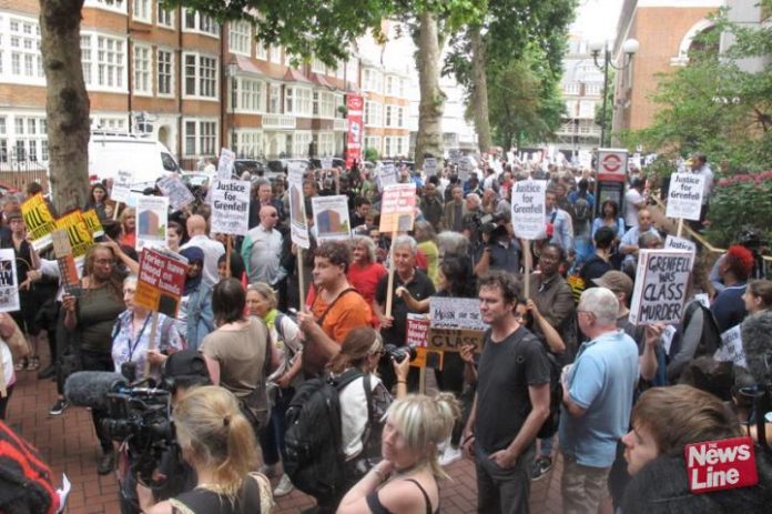 Grenfell survivors and their supporters demonstrate outside the Kensington & Chelsea Council Town Hall which ignored all  warnings of the dangers of an inferno at Grenfell Tower and then ignored them after it