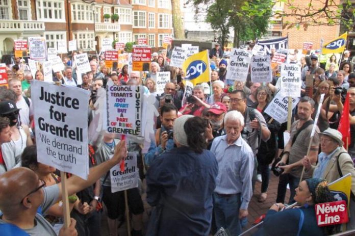 London, England: Grenfell survivors and local residents outside Kensington & Chelsea Council Town Hall demanding the resignation of the council