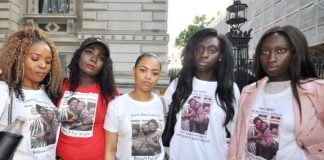 Cousins of Kadija Saye and her mother Mary Mendy, who both died in the Grenfell Tower inferno, on a march to Downing Street
