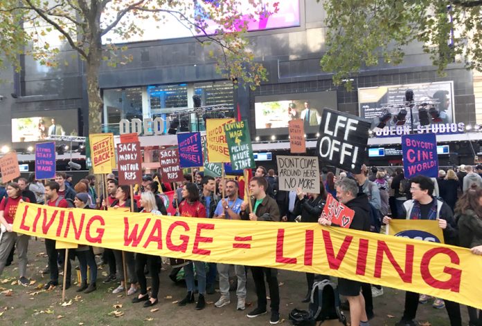 As stars arrived on the red carpet for the opening of the London Film Festival BECTU Picturehouse strikers demonstrated for the London Living Wage
