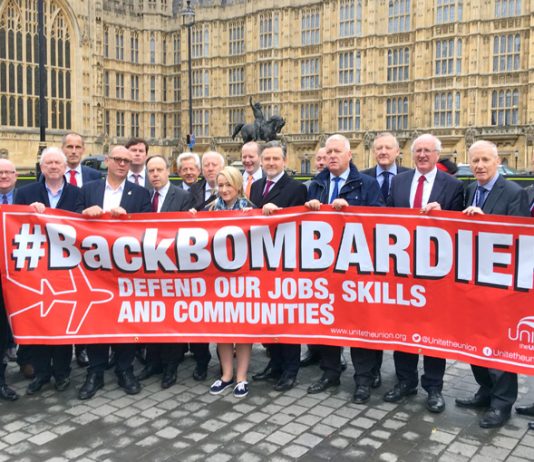 MPs and Bombardier workers outside the House of Commons where the workers demanded that the government defend their jobs