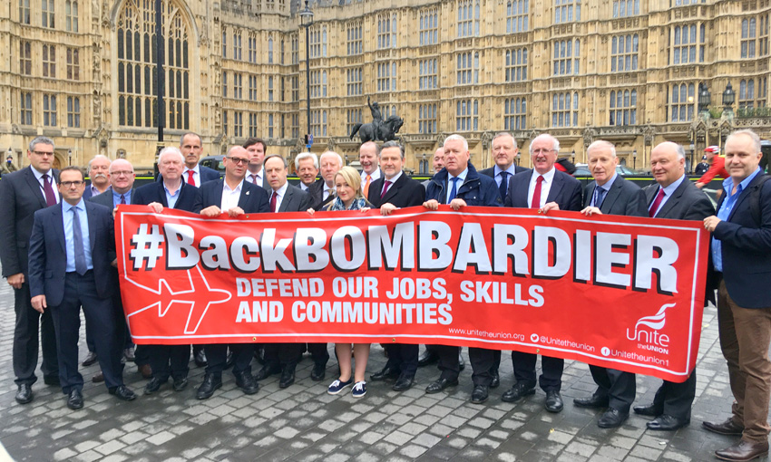 MPs and Bombardier workers outside the House of Commons where the workers demanded that the government defend their jobs