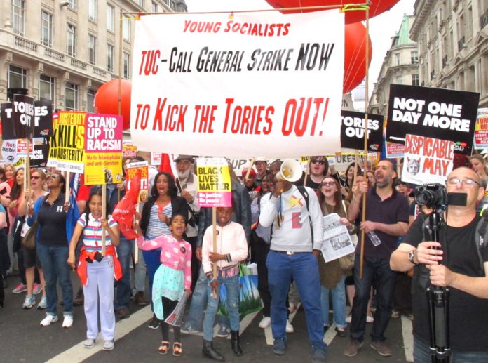 Young Socialists banner on the July 1st march to kick the Tories out demanding the TUC call a general strike