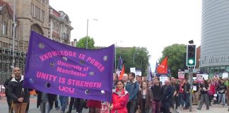 Lecturers, staff and students marching out of the University of Manchester – they are out on strike Monday and Tuesday