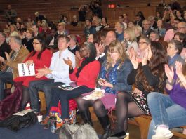 Teachers, parents and support staff at the rally in the Emmanuel Centre before the lobby of Parliament