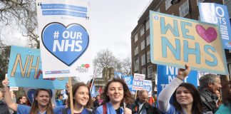 Student nurses marching in defence of the NHS