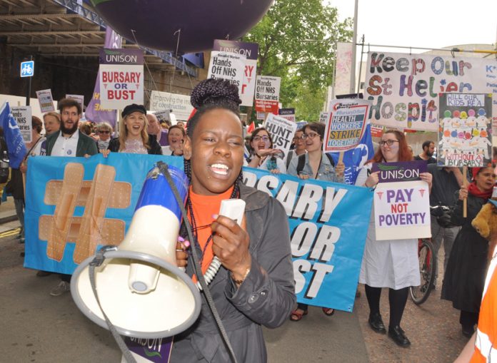 Student nurses and midwives marching to demand that their bursary is restored – axing the bursary has worsened the staffing crisis