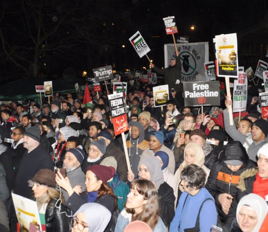 Over 3,000 protesters shouted ‘Free Palestine! Hands off Jerusalem!’ as they gathered outside the US Embassy in Grosvenor Square on Friday night