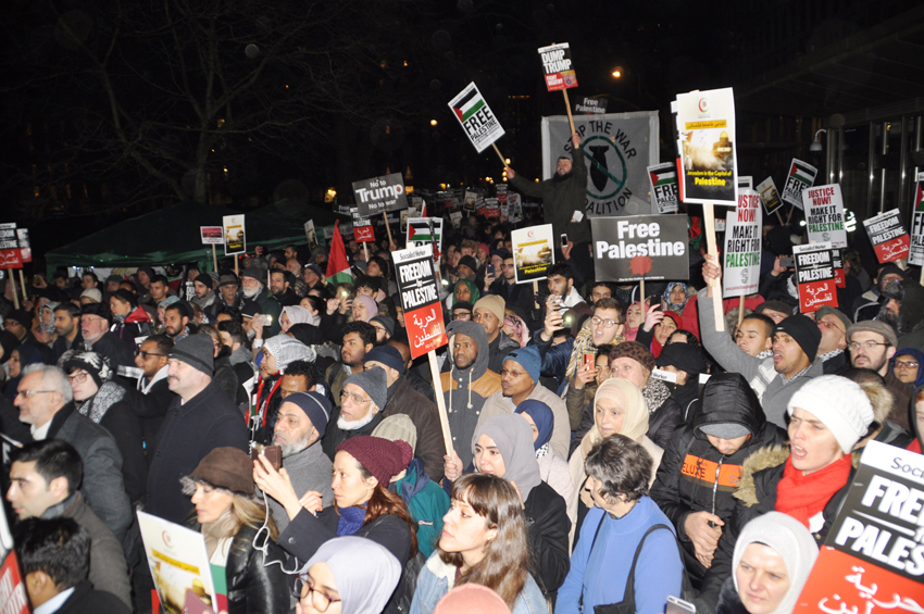 Over 3,000 protesters shouted ‘Free Palestine! Hands off Jerusalem!’ as they gathered outside the US Embassy in Grosvenor Square on Friday night