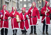 ‘Christmas Pigs’ demonstrated outside four hospitals yesterday lunchtime against private company ISS’ ‘workhouse’ conditions