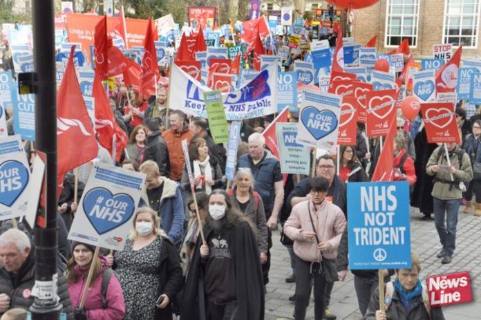 Marchers defending the NHS and making the point that one of the best ways to finance it would be to get rid of Trident