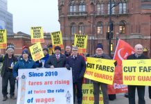 Train staff joined forces with furious commuters demonstrating at stations across the country against massive rail fare hikes which came in yesterday morning – MICK CASH (centre) RMT General Secretary, who joined the King’s Cross protest, called for the c