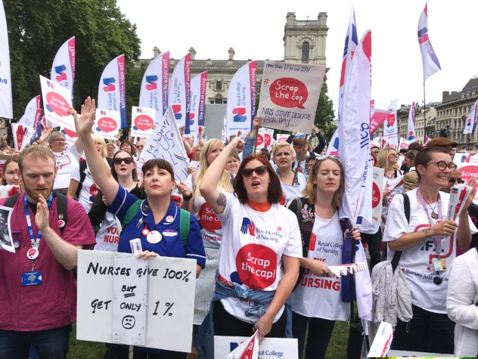 Nurses in Parliament Square demand ‘Scrap the 1% pay cap’ – nurses are so badly paid that there are reports of some visiting food banks